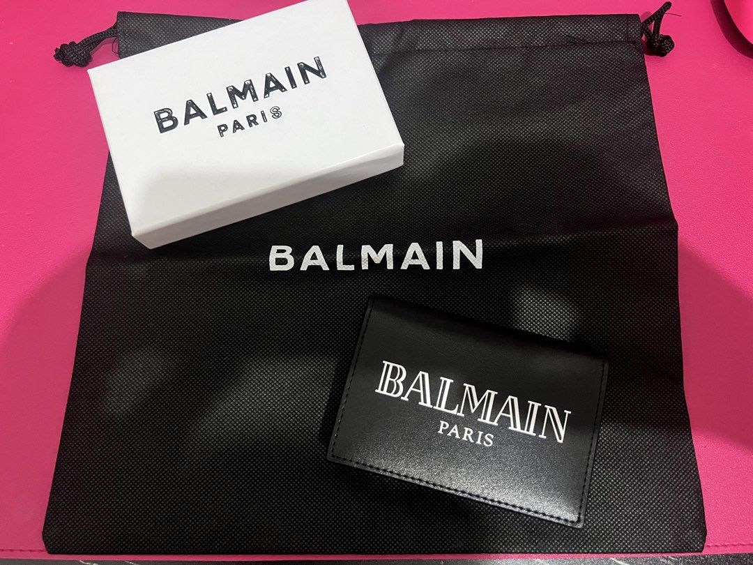 Balmain Paris Card Holder Black Leather (Category: Luxury Bags & Wallets) located in Cainta. Submitted by moonshoppee (Listing ID 1448038158, Image 1). Description: - Balmain Paris card holder - Color: Black - Material: Leather - Ample card slots for organization - Comes with original box - Includes dust bag.