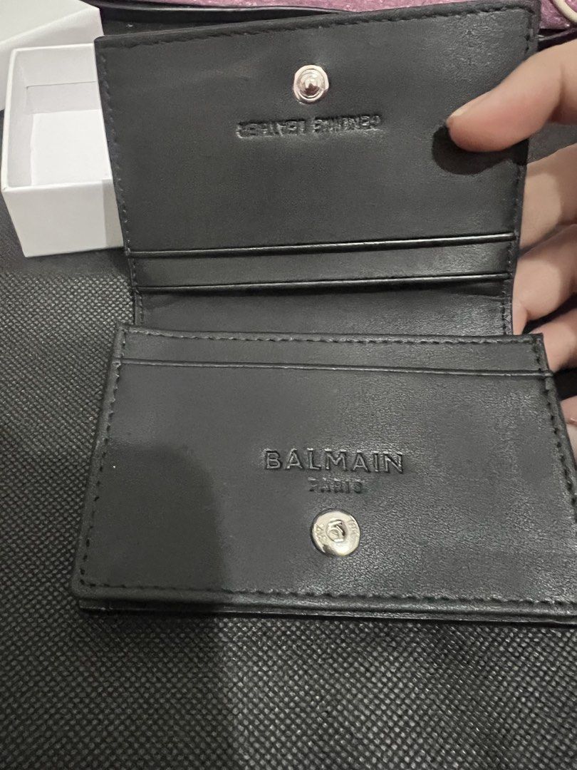 Balmain Paris Card Holder Black Leather (Category: Luxury Bags & Wallets) located in Cainta. Submitted by moonshoppee (Listing ID 1448038158, Image 3). Description: - Balmain Paris card holder - Color: Black - Material: Leather - Ample card slots for organization - Comes with original box - Includes dust bag.