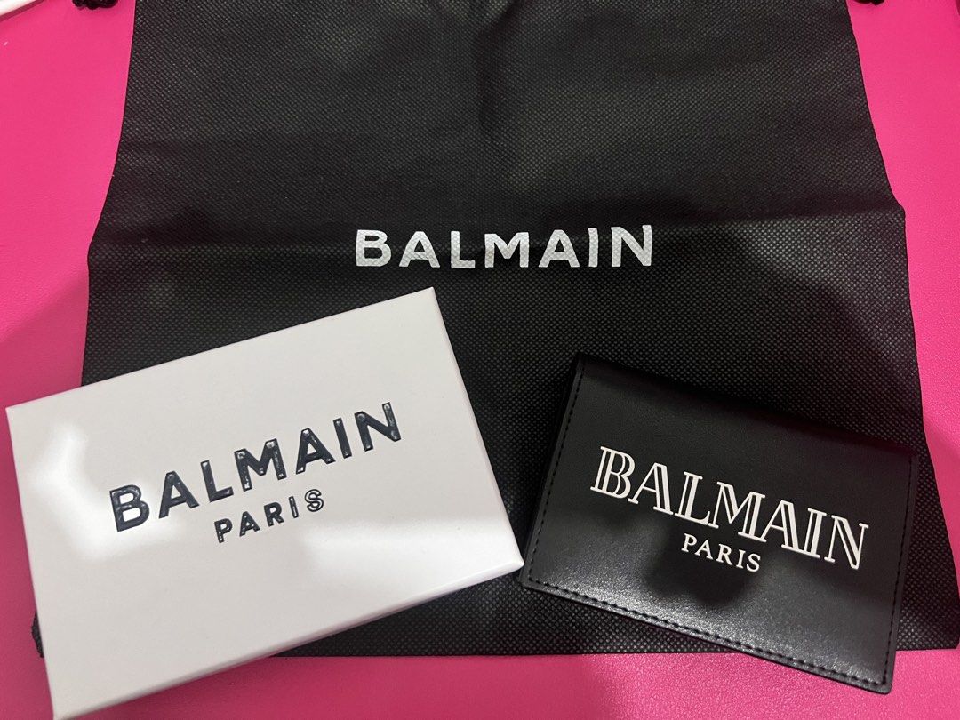 Balmain Paris Card Holder Black Leather (Category: Luxury Bags & Wallets) located in Cainta. Submitted by moonshoppee (Listing ID 1448038158, Image 2). Description: - Balmain Paris card holder - Color: Black - Material: Leather - Ample card slots for organization - Comes with original box - Includes dust bag.