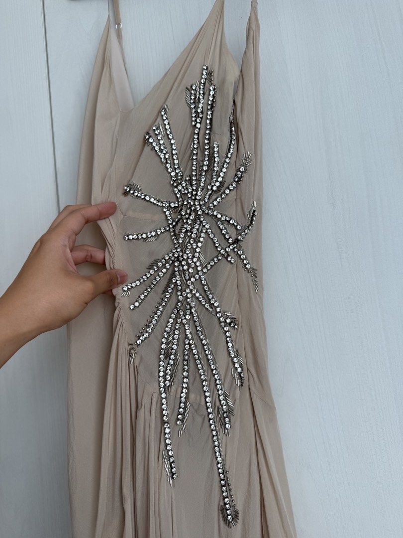 Beige Embellished Slip Dress (Category: Dresses) located in Manila. Submitted by qfclutz (Listing ID 1447971219, Image 2). Description: Name: Beige asymmetrical midi dress with rhinestone starbust detail Size: Bust 34 | Waist 27 | Hips 36 SRP: P6,000 Brand: Autograph.