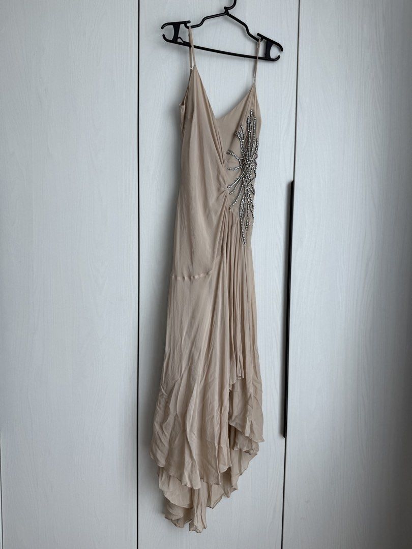 Beige Embellished Slip Dress (Category: Dresses) located in Manila. Submitted by qfclutz (Listing ID 1447971219, Image 1). Description: Name: Beige asymmetrical midi dress with rhinestone starbust detail Size: Bust 34 | Waist 27 | Hips 36 SRP: P6,000 Brand: Autograph.