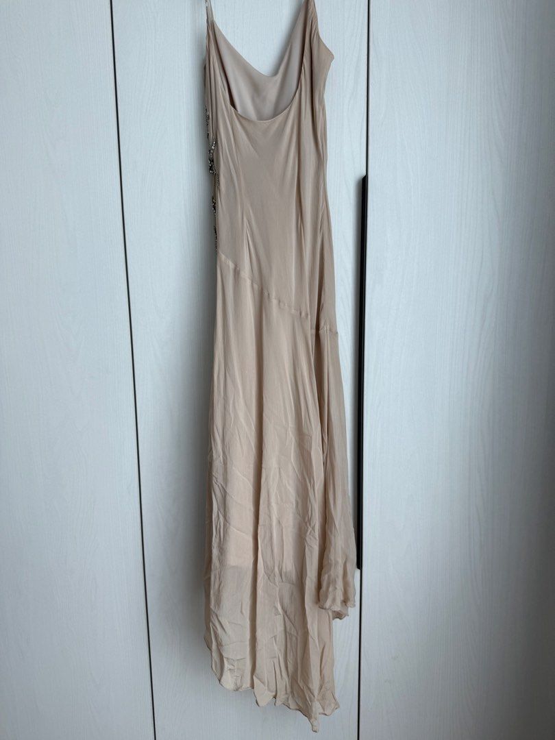 Beige Embellished Slip Dress (Category: Dresses) located in Manila. Submitted by qfclutz (Listing ID 1447971219, Image 3). Description: Name: Beige asymmetrical midi dress with rhinestone starbust detail Size: Bust 34 | Waist 27 | Hips 36 SRP: P6,000 Brand: Autograph.