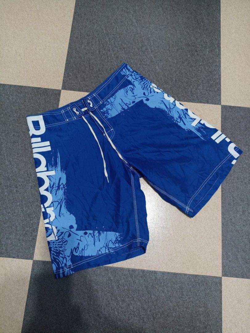 Billabong Blue Board Shorts Size 36 (Category: Swim Trunks & Board Shorts) located in Marawi City. Submitted by abdullah0692139 (Listing ID 1448037644, Image 1). Description: - Blue Billabong board shorts - Size 36 - Features graphic print and Billabong logo - Made with factory stretch material - Comes with comb tag - Ideal for swimming or surfing.