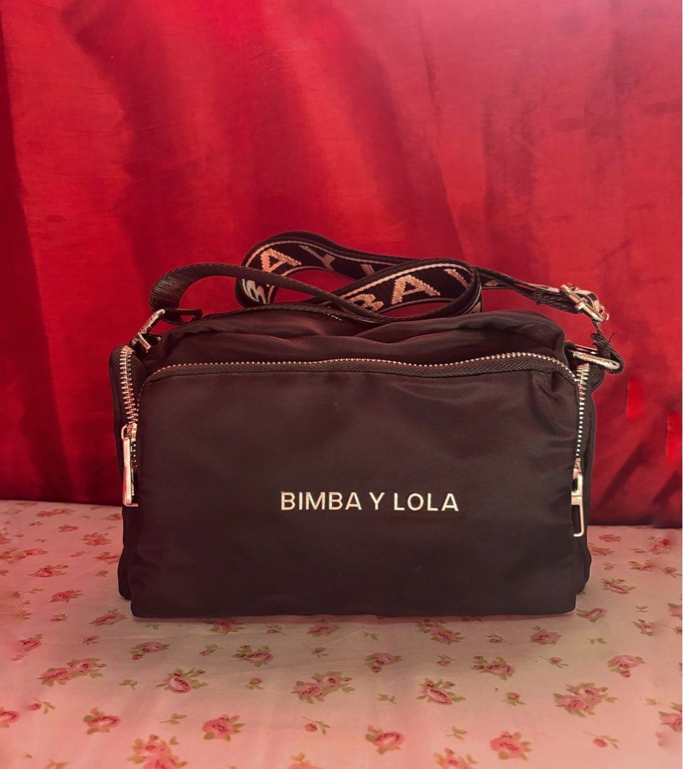 Bimba Nylon Cross body Bag (Category: Cross-body Bags) located in Malolos. Submitted by cheerz21 (Listing ID 1447890927, Image 1). Description: Personal Preloved Bïmbä Y Lölå Crossbody bag Width: 26cm height:16cm Color Black with metallic logo Adjustable logo strap Multiple pockets Barely used, good as new. No flaws/ issues. No return, no exchange. #Crossbodybag #shoulderbag #bimbaylola #nylonbag #womensbag #ladiesbag #bag #bags.