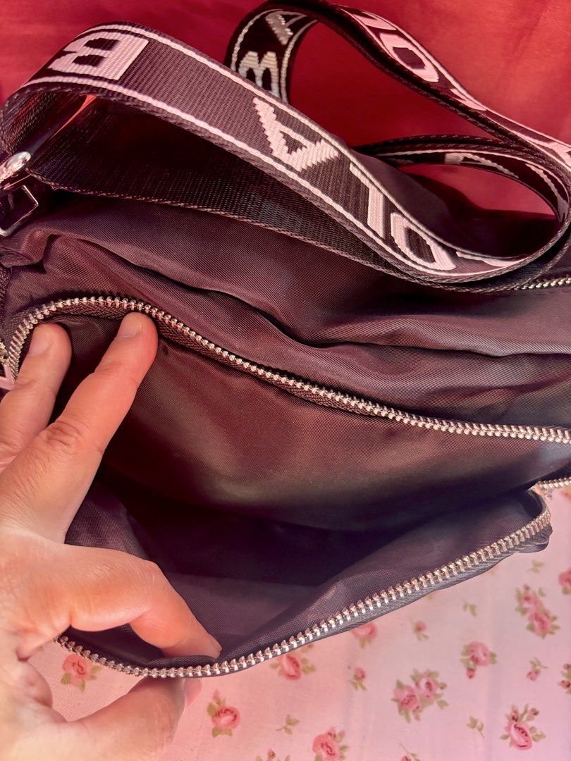 Bimba Nylon Cross body Bag (Category: Cross-body Bags) located in Malolos. Submitted by cheerz21 (Listing ID 1447890927, Image 3). Description: Personal Preloved Bïmbä Y Lölå Crossbody bag Width: 26cm height:16cm Color Black with metallic logo Adjustable logo strap Multiple pockets Barely used, good as new. No flaws/ issues. No return, no exchange. #Crossbodybag #shoulderbag #bimbaylola #nylonbag #womensbag #ladiesbag #bag #bags.