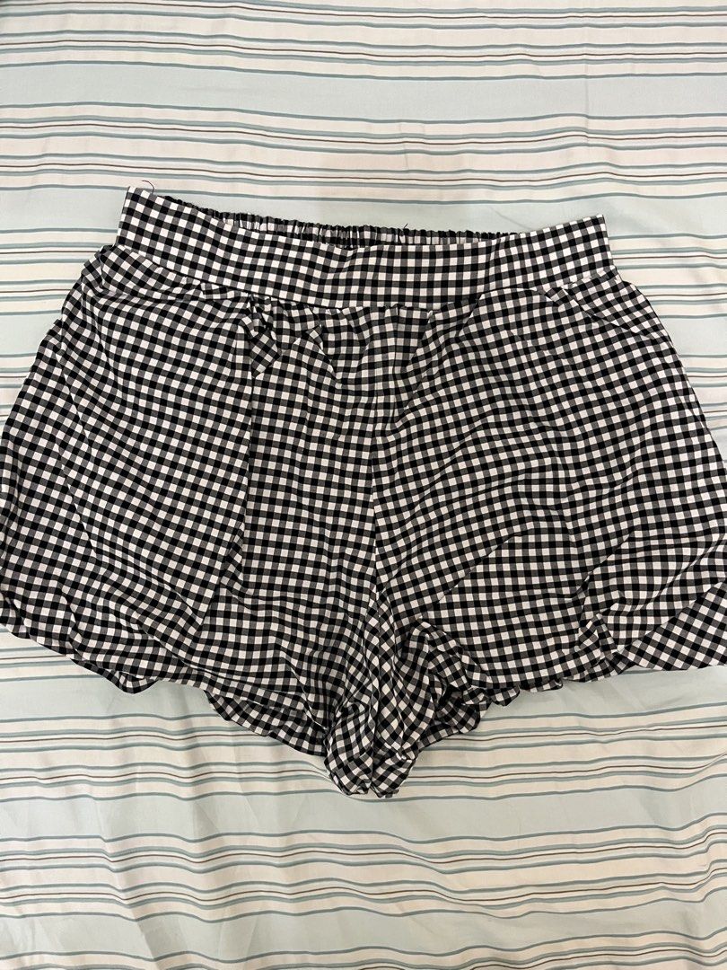 Black and white balloon shorts (Category: Shorts) located in Tuguegarao City. Submitted by declutterf (Listing ID 1447961419, Image 1). Description: Very pretty when worn! Has garter at the back Fits Xs-S.
