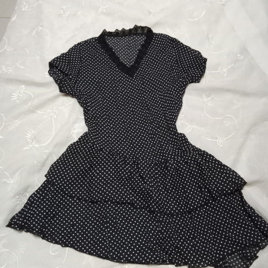 Black and White Polka Dot Ruffle Mini Dress (Category: Dresses) located in Talisay. Submitted by peonisces (Listing ID 1448010881, Image 1). Description: small - Cute black dress with white polka dots - Short sleeves - Ruffled hem - Lace trim neckline - Ideal for casual outings or a day out - Easy to wear and style - Fits well.