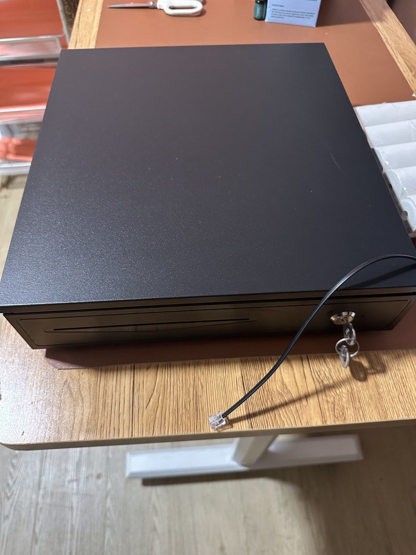Black Cash Drawer with Receipt Rolls cash register
