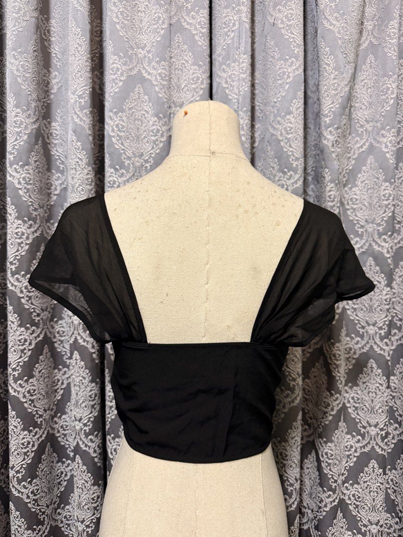 Black Corset Top with Sheer Cap Sleeves (Category: Others Tops) located in Iloilo. Submitted by happywhale_bf81c9 (Listing ID 1447947935, Image 3). Description: - Black corset top - Sweetheart neckline - Front hook and eye closure - Sheer, fluttery cap sleeves - Cropped length - Ideal for night outs or special occasions.