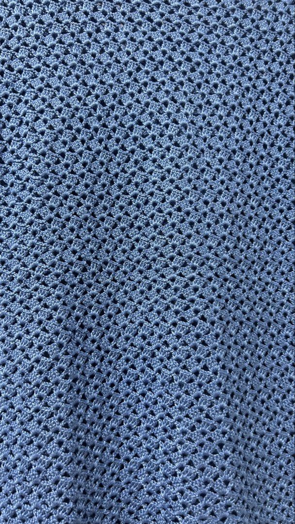 Blue Crochet Short Sleeve Top (Category: Blouses) located in San Fernando. Submitted by TheBTBs (Listing ID 1447948218, Image 2). Description: - Light blue crochet top - Short sleeves -handmade - Open knit pattern - Ribbed hem - Versatile: great for layering or wearing on its own - Approx. Measurements: 22 inches length, 18 inches chest width ⚠️ Reminder Color may appear slightly different in photos due to lighting and screen settings. No return 