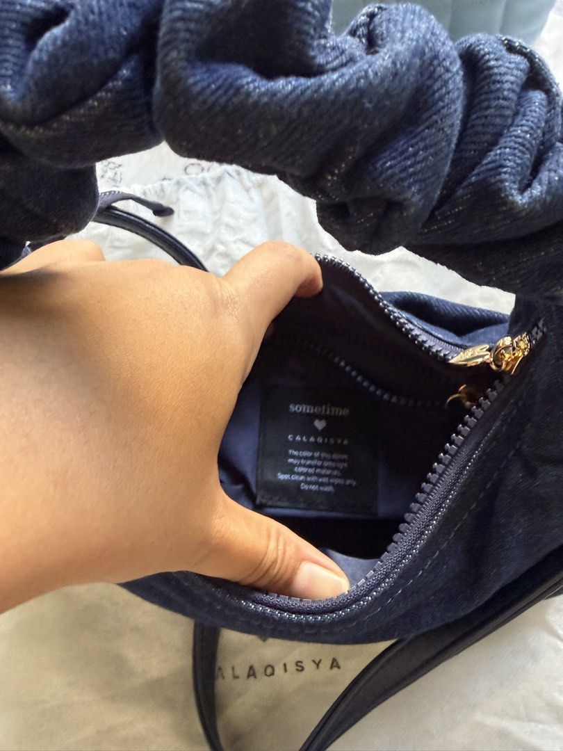 Calaqisya X Sometimes Rm150 (Category: Cross-body Bags) located in Johor Bahru. Submitted by hannfazli (Listing ID 1447972669, Image 2). Description: Calaqisya x Sometimes Denim Condition 9/10 With box & dustbag Rm150 .