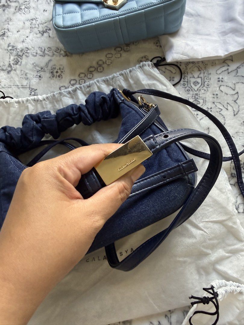 Calaqisya X Sometimes Rm150 (Category: Cross-body Bags) located in Johor Bahru. Submitted by hannfazli (Listing ID 1447972669, Image 3). Description: Calaqisya x Sometimes Denim Condition 9/10 With box & dustbag Rm150 .
