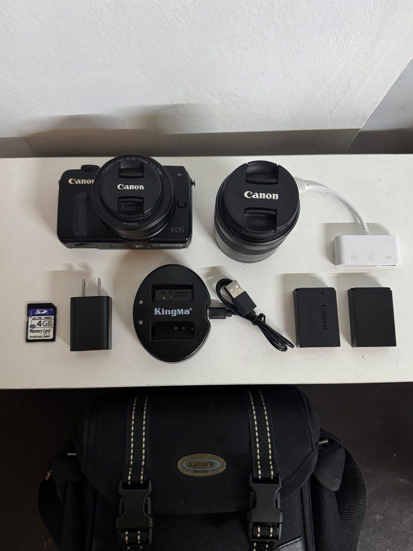 Canon EOS M Mirrorless Camera (Category: Cameras) located in Taguig. Submitted by kgilliann (Listing ID 1447891705, Image 2). Description: Canon EOS M Mirrorless Camera - 18 MP APS-C sensor - Canon EF-M lens mount - 3.0-inch touchscreen LCD - 8/10 body cosmetics - Fully functional Inclusions: - 22 mm lens (kit lens) and 18-55 mm lens - 4 GB memory card - Screen protector (although may scratches na rin 'yung protector) - Original battery + extra b
