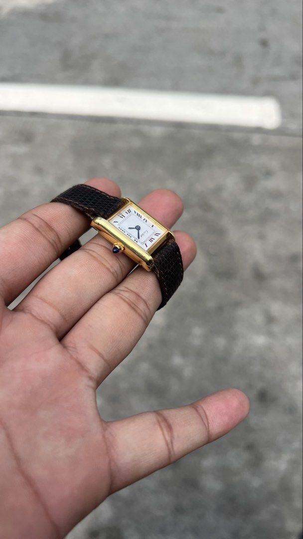 Cartier Tank Must White Dial (Category: Luxury Watches) located in Caloocan City. Submitted by _alennchan (Listing ID 1448016841, Image 2). Description: Cartier Tank Must White Dial - Condition: 9.7/10 - No issue - Year 1990 - Case size approx 21x29mm - Manual Winding Movement - Original Leather Strap even Buckles - All Original Inclusions: Unit, Inner Box, Outer Box and Manuals 🏷️ 77,999 PHP Negotiable FB page: Mga relo ni alenn at iba pa Tikto