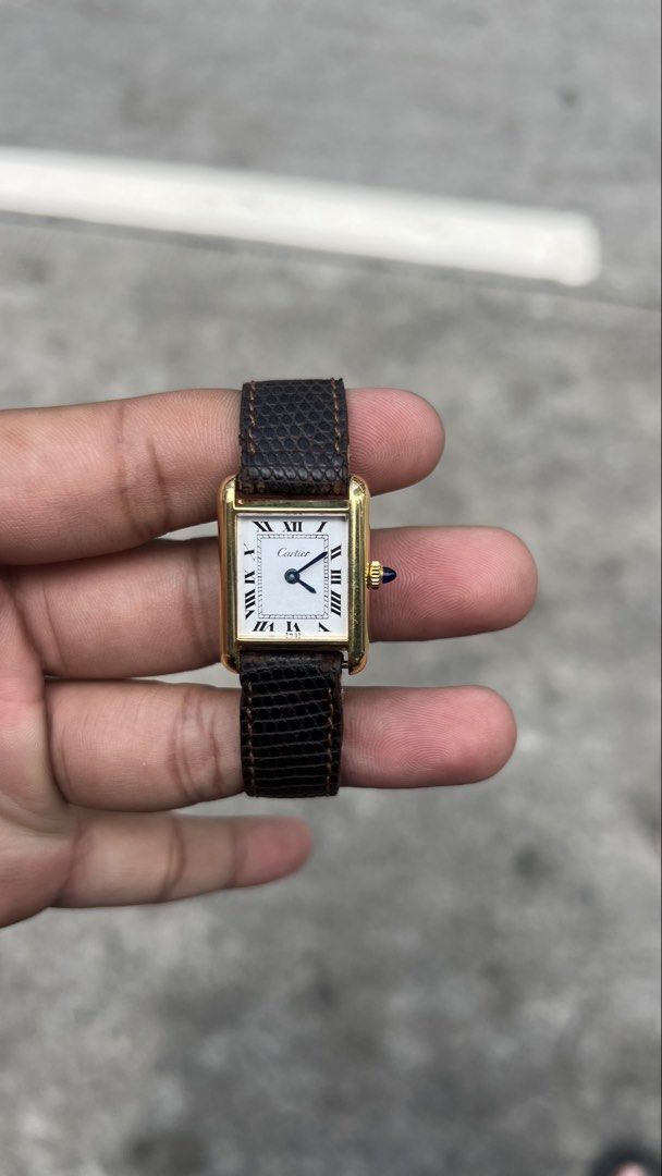 Cartier Tank Must White Dial (Category: Luxury Watches) located in Caloocan City. Submitted by _alennchan (Listing ID 1448016841, Image 1). Description: Cartier Tank Must White Dial - Condition: 9.7/10 - No issue - Year 1990 - Case size approx 21x29mm - Manual Winding Movement - Original Leather Strap even Buckles - All Original Inclusions: Unit, Inner Box, Outer Box and Manuals 🏷️ 77,999 PHP Negotiable FB page: Mga relo ni alenn at iba pa Tikto
