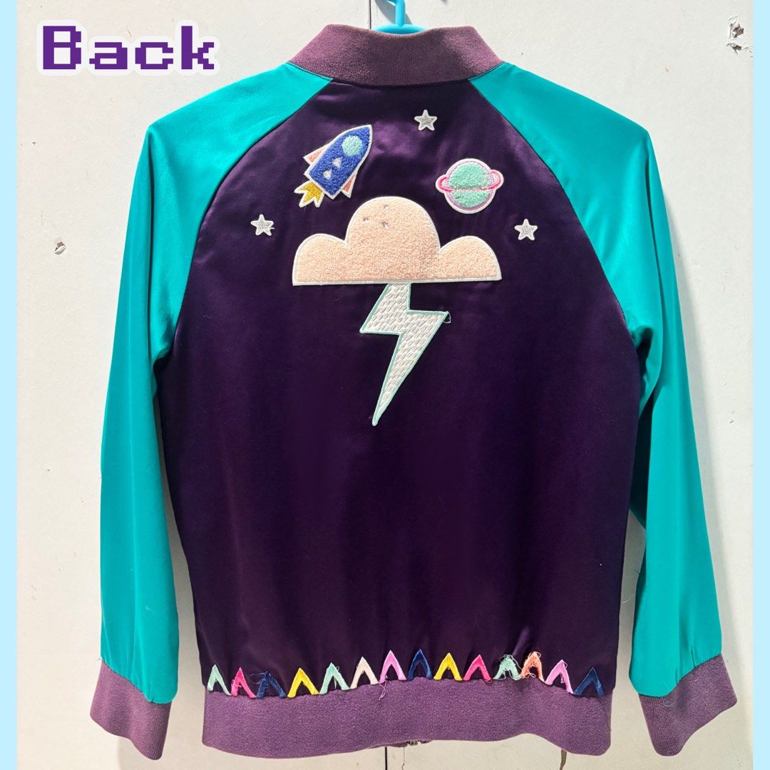 Cat & Jack Space Jersey Bomber Jacket |Space Jacket (Category: Babies & Kids Fashion) located in Rizal. Submitted by itzpheebs (Listing ID 1447966126, Image 3). Description: Details of Jacket: - Can be for kids or womens - Satin purple and teal bomber jacket - Features space-themed patches: lightning bolts, rocket, planet, cloud - Ribbed cuffs and hem for a snug fit - Great for layering on cooler days Payment Method: Gcash or Bank transfer (BPI) 