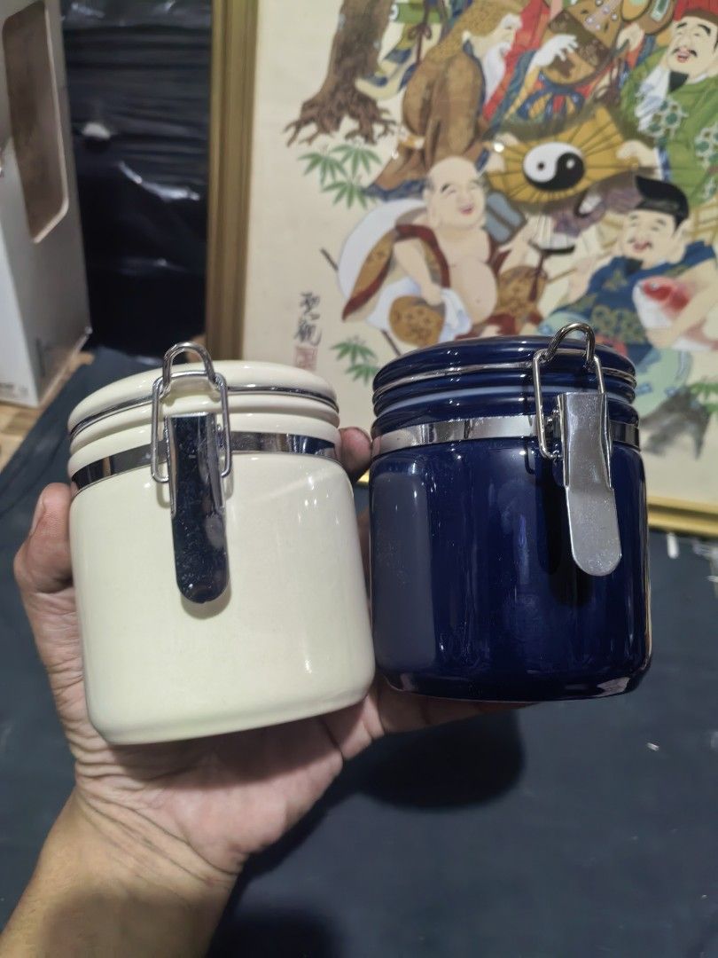 Ceramic Canisters With Airtight Sealing Lids. (Category: Food Organization & Storage) located in Cebu City. Submitted by dudes_villanueva (Listing ID 1447891681, Image 1). Description: Ceramic Canisters With Airtight Sealing Lids. Brand New 📌 These containers feature metal clips to ensure a tight seal for food storage. 📌 In excellent condition. Diameter: 3.25 in Height: 3.5 in.