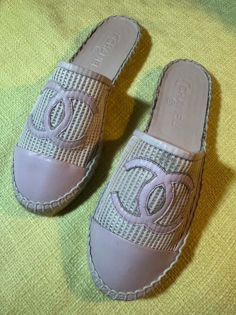 Chanel Pink CC Espadrille Mules Slides (Category: Sneakers & Footwear) located in Pasay City. Submitted by tobio82 (Listing ID 1448070393, Image 2). Description: - Chanel espadrille mules - Chic soft pink color - Iconic CC logo detail - Woven material with leather cap toe - Convenient slip-on style - Ideal for casual outings and everyday wear - Please review all photos for detailed condition.