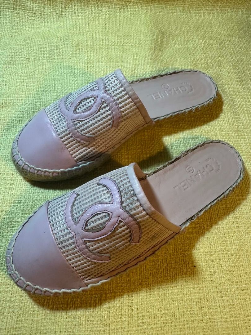 Chanel Pink CC Espadrille Mules Slides (Category: Sneakers & Footwear) located in Pasay City. Submitted by tobio82 (Listing ID 1448070393, Image 1). Description: - Chanel espadrille mules - Chic soft pink color - Iconic CC logo detail - Woven material with leather cap toe - Convenient slip-on style - Ideal for casual outings and everyday wear - Please review all photos for detailed condition.