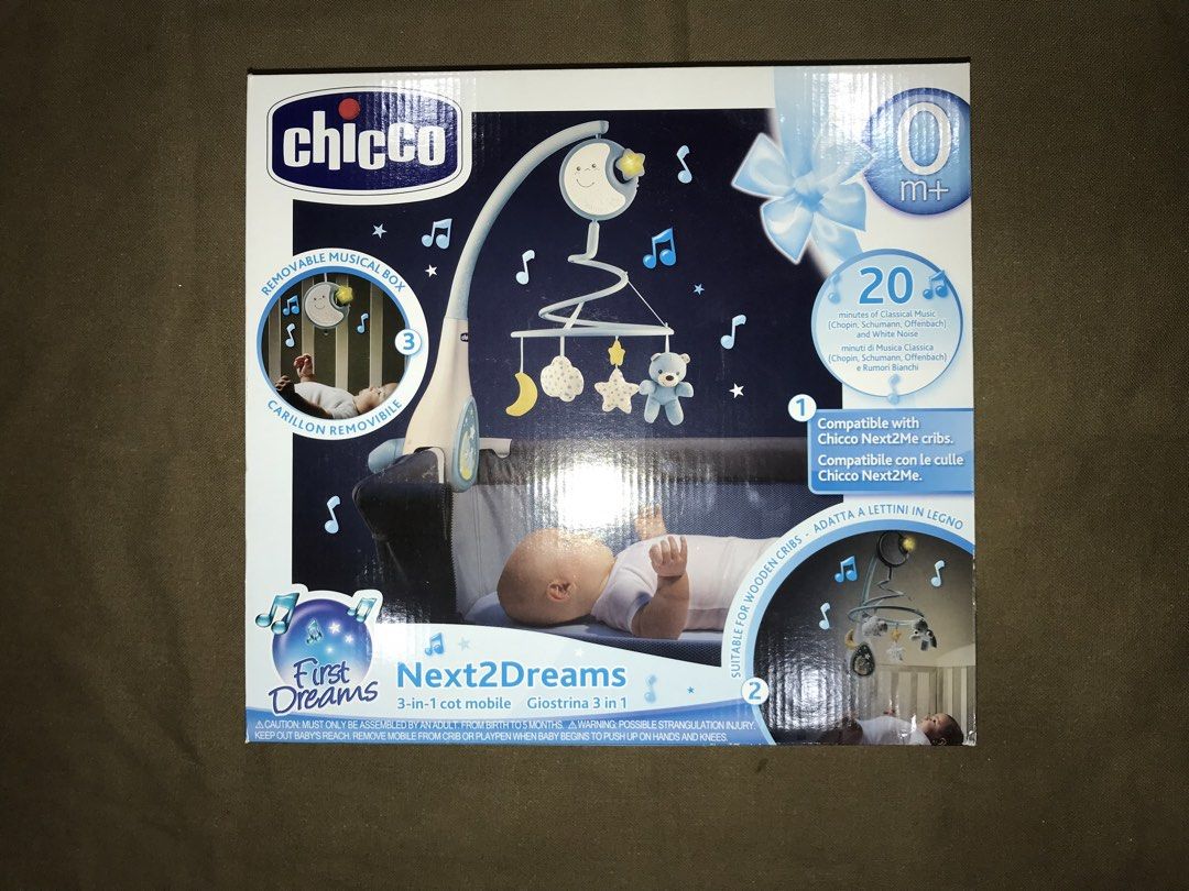 Chicco Next2Dreams 3-in-1 Musical Cot Mobile (Category: Infant Playtime) located in Quezon City. Submitted by teacher_nins (Listing ID 1448001200, Image 1). Description: Chicco Next2Dreams 3-in-1 cot mobile - Plays music and features a night light - Removable musical box for on-the-go soothing - Easily attaches to cribs - Includes cute teddy bear, moon, and star toys - Ideal for creating a calming nursery environment - needs batteries ‼️With orig