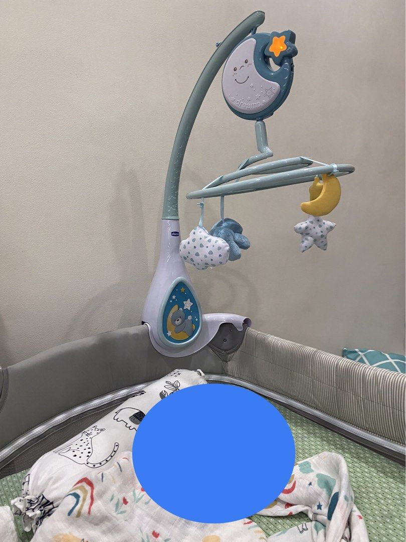 Chicco Next2Dreams 3-in-1 Musical Cot Mobile (Category: Infant Playtime) located in Quezon City. Submitted by teacher_nins (Listing ID 1448001200, Image 2). Description: Chicco Next2Dreams 3-in-1 cot mobile - Plays music and features a night light - Removable musical box for on-the-go soothing - Easily attaches to cribs - Includes cute teddy bear, moon, and star toys - Ideal for creating a calming nursery environment - needs batteries ‼️With orig