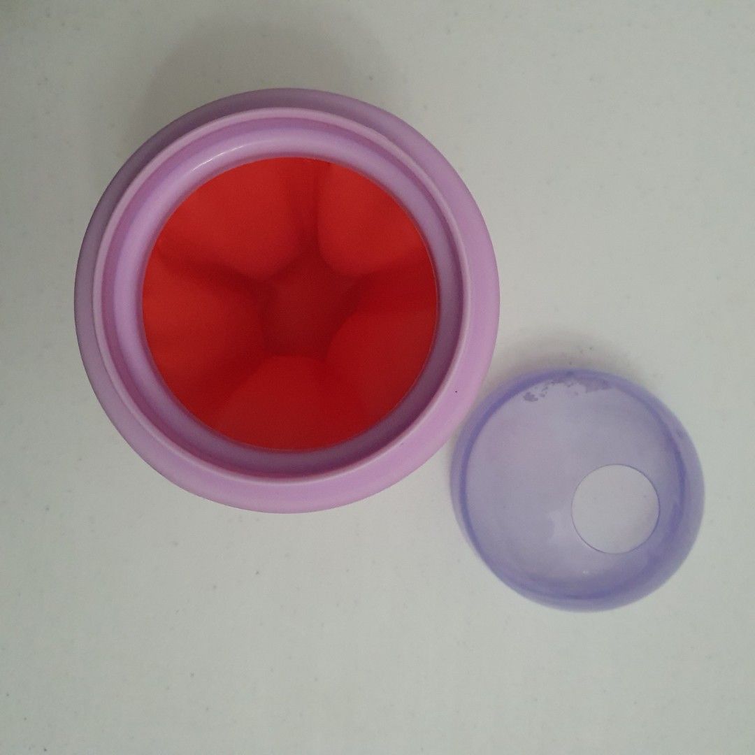 ChillFactor Pink Slushy Maker Cup with Lid and Rings (Category: Other Kitchenware & Tableware) located in Paranaque City. Submitted by cobien (Listing ID 1448073016, Image 3). Description: - Make delicious slushies at home! - Pink ChillFactor slushy maker cup with purple lid and rings. - Easy to use: Freeze, fill with your favorite drink, and squeeze. - Fun for all ages and perfect for beating the heat..