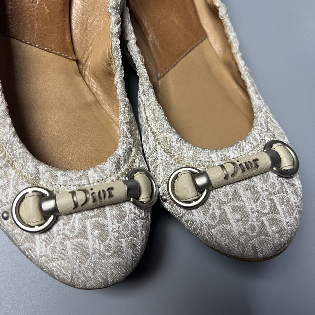 Christian Dior Monogram Canvas Ballet Flats (Category: Flats & Sandals) located in Bago City. Submitted by g___shop (Listing ID 1448000218, Image 3). Description: - Authentic - Classic Dior monogram canvas flats - Signature beige and white pattern - Features iconic Dior buckle detail - Comfortable leather interior and sole - Easy slip-on style - Perfect for everyday or dressing up.