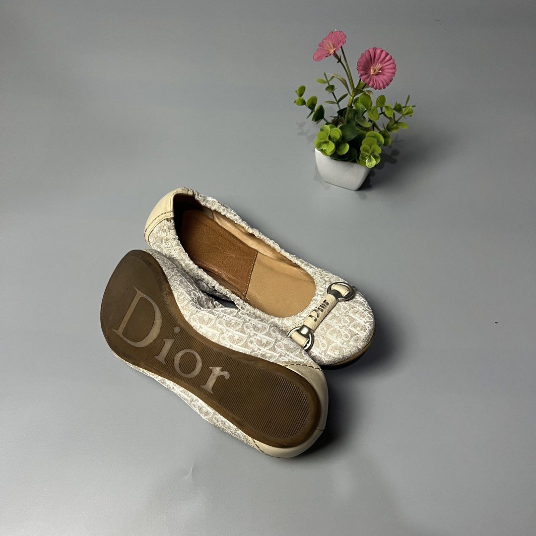 Christian Dior Monogram Canvas Ballet Flats (Category: Flats & Sandals) located in Bago City. Submitted by g___shop (Listing ID 1448000218, Image 2). Description: - Authentic - Classic Dior monogram canvas flats - Signature beige and white pattern - Features iconic Dior buckle detail - Comfortable leather interior and sole - Easy slip-on style - Perfect for everyday or dressing up.