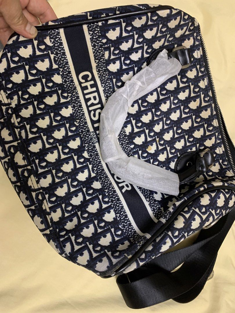Christian Dior Oblique Canvas Sling Bag (Category: Luxury Bags & Wallets) located in Bulacan. Submitted by heartlove_holb (Listing ID 1448008849, Image 1). Description: Classic Dior Oblique canvas sling bag. Features the iconic all-over logo print. Adjustable strap for comfortable wear. Interior has a zippered pocket and slip pockets. Some minor marks on the canvas, as pictured. Great for everyday use..