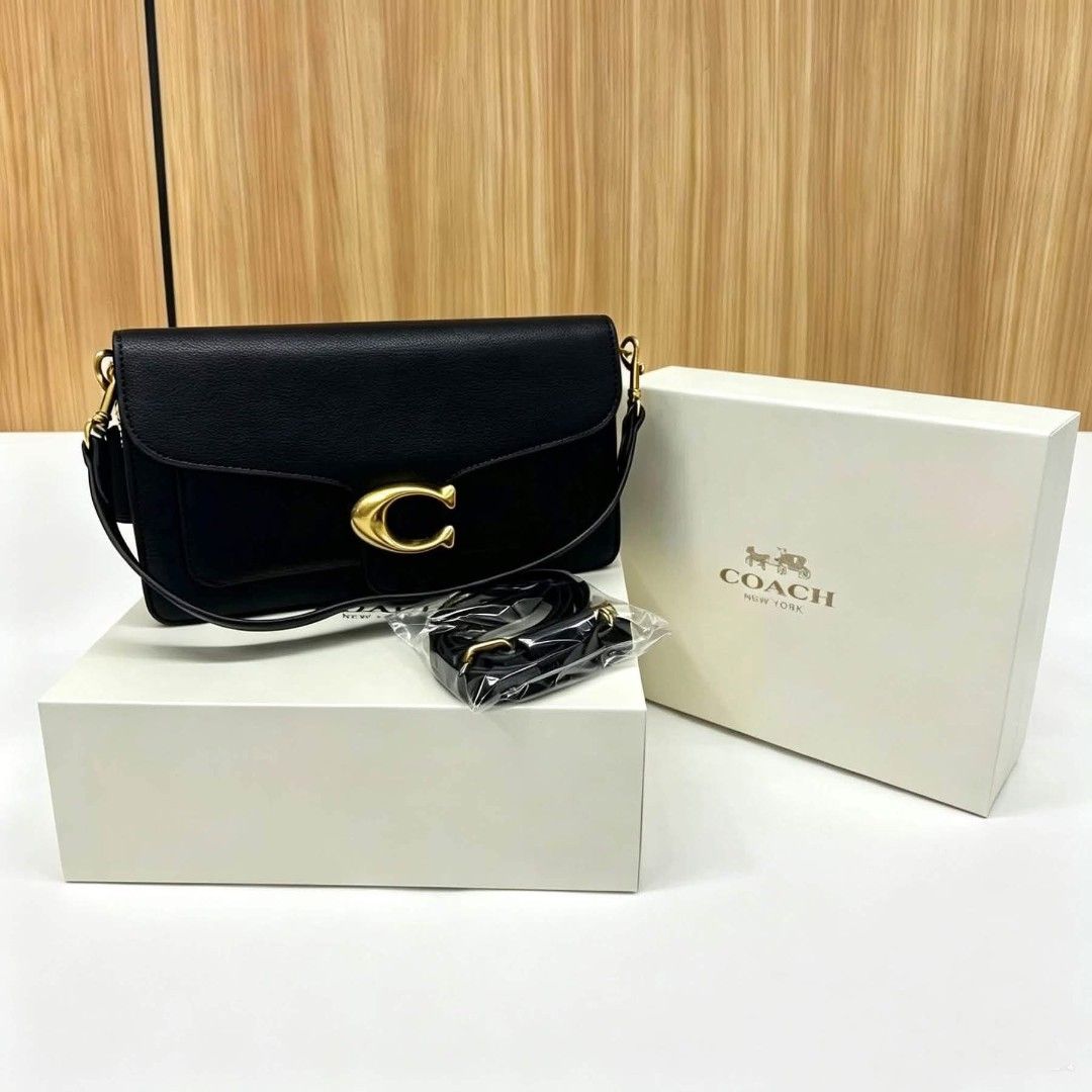 Coach Tabby Shoulder Bag 26 Black (Category: Luxury Bags & Wallets) located in Manila. Submitted by luminouseluxe (Listing ID 1447923356, Image 1). Description: - Authentic Coach Tabby Bag - Includes original box and dust bag - Features elegant gold hardware - Adjustable strap for versatile wear - Ideal for daily use or special events.