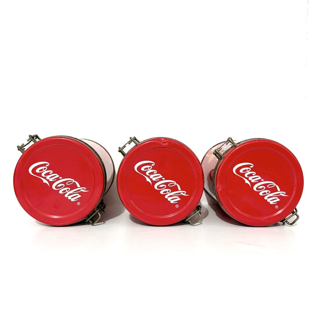 Coca-Cola Canisters Set of 3 (Category: Food Organization & Storage) located in Santa Rosa. Submitted by shikaricollectibles (Listing ID 1448073079, Image 2). Description: Coca-Cola Canisters Set of 3 Canisters have rust and dirt, especially on the metal wrapped around them and on the locks themselves. There is also deformation on some parts of the edges. Price: ₱500 set Location: Santa Rosa, Laguna/ Cubao, QC MOD: J&T/ LBC/ Lalamove MOP: Gcash/ 