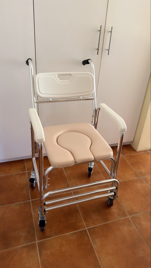 Commode Shower Chair with Wheels and Padded Seat (Category: Medical Supplies & Tools) located in Caloocan City. Submitted by princessebb (Listing ID 1447912206, Image 2). Description: Comfortable commode chair with padded seat and backrest, easy-glide wheels, and supportive armrests. Ideal for mobility assistance and built for durability. Cost Php 4900, Selling for Php 3200 0nly .