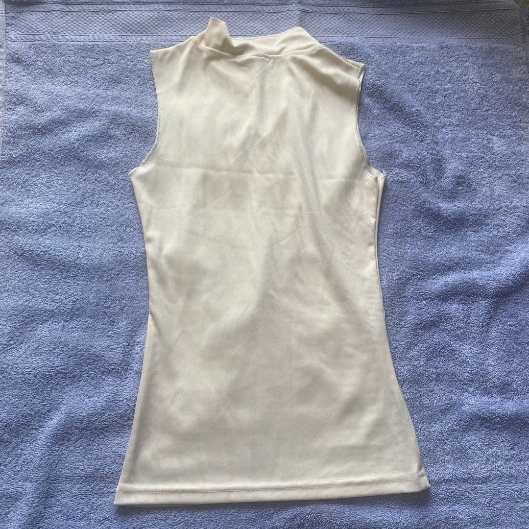 Cream Printed Top (Category: Sleeveless) located in Taguig. Submitted by floatingpoints (Listing ID 1447933694, Image 2). Description: only used once! fits xs-s :) RFS: not my style anymore loc: qc/taguig mop: gcash only mod: j&t or lalamove (within mm) pls manage your expectations since these are all preloved, unless tagged as bnwt :).