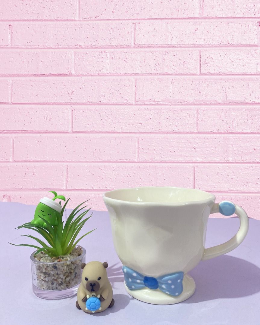 Cute Cream Mug with Blue Polka Dot Bow (Category: Coffee & Tea Tableware) located in Mandaluyong City. Submitted by pure.ice21 (Listing ID 1447970482, Image 1). Description: 📍 Meet-up Locations: - Mandaluyong City - Batangas City (Alangilan) - Quezon Province (Sariaya) 🚚 Delivery Options: J&T Express Lalamove 💳 Payment Methods: - BPI - GoTyme - MariBank - GCash 📩 Feel free to message me if you have any questions or would like additional photo