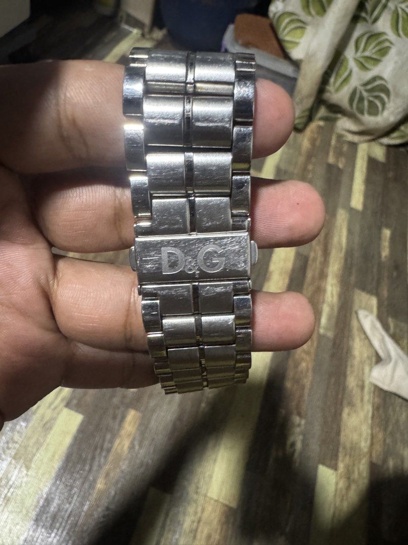 D&G Stainless Steel Watch (Category: Men's Watches) located in Quezon City. Submitted by angace13 (Listing ID 1447999393, Image 3). Description: - Authentic D&G watch - Striking blue textured dial - Durable stainless steel band and casing - Water resistant up to 5 ATM - All stainless steel construction.