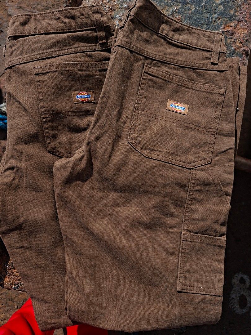 Dickies Brown Carpenter Pants Casual Fit (Category: Jeans) located in Malabon City. Submitted by thriftlang.01 (Listing ID 1447891478, Image 1). Description: 1.5k Each - Brand: Dickies - Color: Brown - Style: Carpenter Pants - Fit: Casual, Regular Size - Features: Classic Dickies look, multiple pockets, hammer loop - Material: Durable fabric - Condition: Brand new with original tags attached - Ideal for: Workwear or everyday wear.