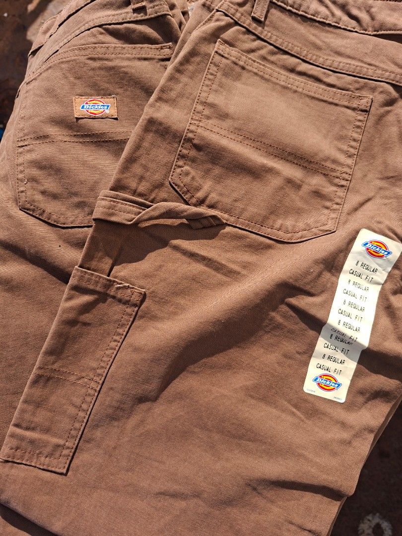Dickies Brown Carpenter Pants Casual Fit (Category: Jeans) located in Malabon City. Submitted by thriftlang.01 (Listing ID 1447891478, Image 2). Description: 1.5k Each - Brand: Dickies - Color: Brown - Style: Carpenter Pants - Fit: Casual, Regular Size - Features: Classic Dickies look, multiple pockets, hammer loop - Material: Durable fabric - Condition: Brand new with original tags attached - Ideal for: Workwear or everyday wear.