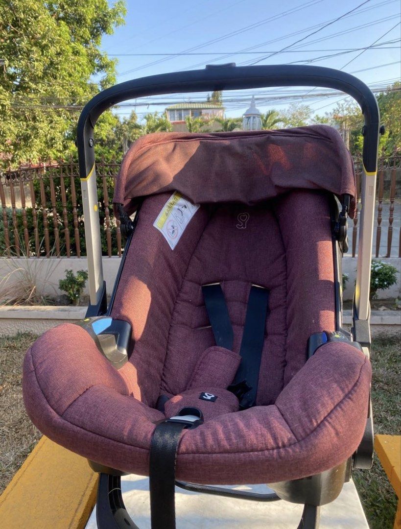 Doona+ Infant Car Seat Stroller - Burgundy (Category: Strollers) located in San Pedro. Submitted by icesyp (Listing ID 1447969867, Image 2). Description: Authentic Doona Infant Car Seat + Stroller for sale. Well-loved and still fully functional with normal signs of usage. Smooth folding/unfolding mechanism and wheels in good working condition. Ideal as a stroller/travel system or backup unit. Details: * Second owner * Manufacturing Date: 16 May 2