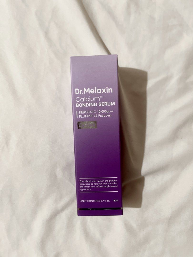 Dr. Melaxin Calcium Bonding Serum 80ml (Category: Face Care) located in Manila. Submitted by cailleshope (Listing ID 1447993531, Image 2). Description: - Dr. Melaxin Calcium Bonding Serum - Key Ingredients: REBORNIC 10,000ppm & PLUMPEP (5-Peptides) - Benefits: Promotes smoother and firmer-looking skin - Appearance: Refined, supple look - Size: 2.7 fl. oz. / 80ml.