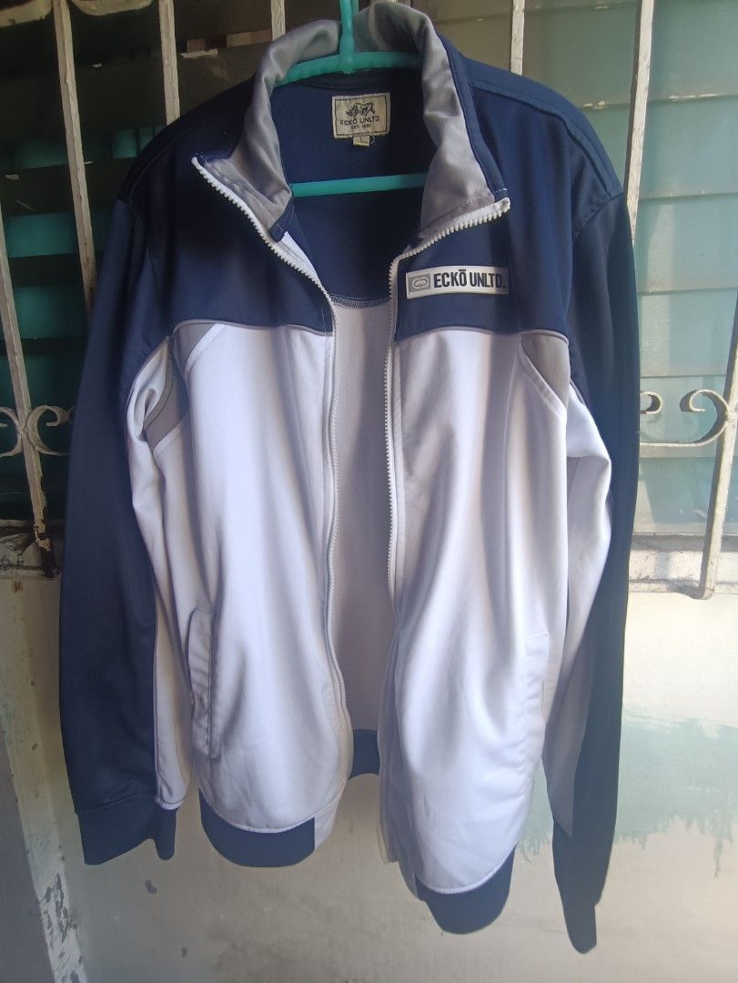 Ecko Unltd. Track Jacket Navy White Grey (Category: Coats, Jackets and Outerwear) located in Cavite. Submitted by o.d2002 (Listing ID 1447945922, Image 3). Description: Ecko Unltd. track jacket Color: Navy blue with white and grey panels - Size L Little issue lng. Natanggal yung zipper head pero kaya naman ibalik. Loc. Alabang, Muntinlupa Pm if interested.