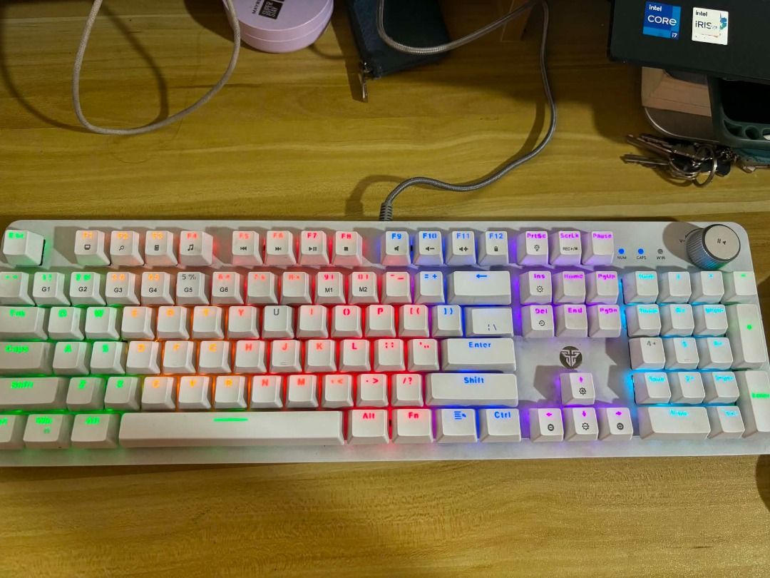 Fantech Maxpower MK853 Mechanical Keyboard White RGB (Category: Computer Keyboard) located in Manila. Submitted by cyrineravina (Listing ID 1447958677, Image 1). Description: Fantech Maxpower MK853 Mechanical Keyboard White Casing with RGB Lighting Issue: Num key keeps turning on/off Enter key clicked as 4 if Num is enabled Some keys have no light No box.