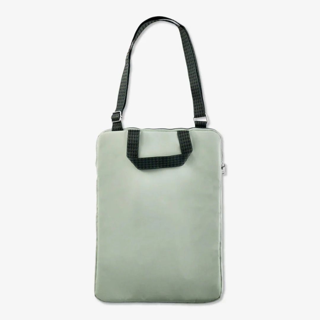 Flying Tiger Laptop Sleeve (Category: Laptop Bags & Sleeves) located in Quezon City. Submitted by mariaelaine_ (Listing ID 1447919898, Image 3). Description: Laptop Sleeve 15-inch Dimensions: 28 x 38.5 x 2 cm Color: Serene Green Material: Polyester No issues or flaws.