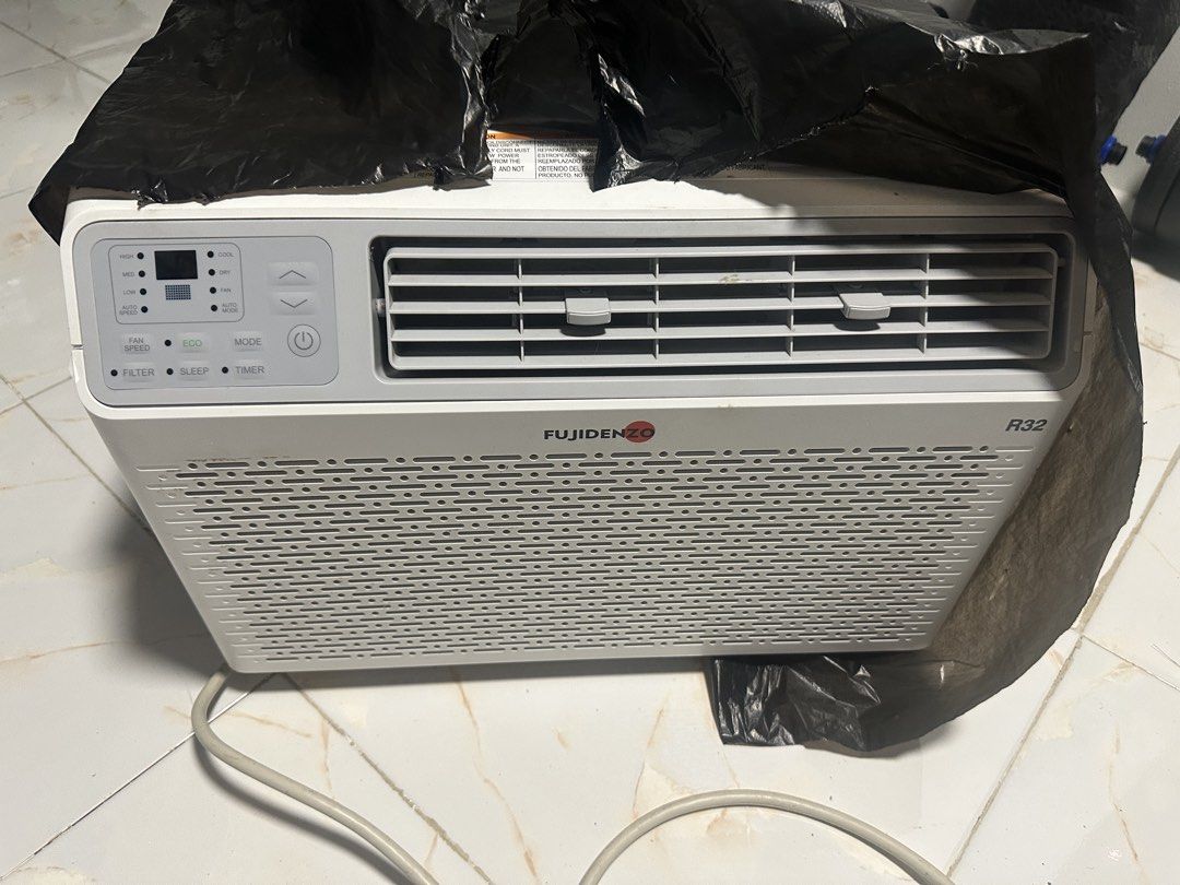 Fujidenzo Window Type Aircon For sale (Category: Air Conditioning and Heating) located in Quezon City. Submitted by bendzfren13 (Listing ID 1448022051, Image 1). Description: - Fujidenzo Window Type Aircon - .75 HP -INVERTER GRADE ONLY -with remote - Uses eco-friendly R32 refrigerant - Multiple modes: Fan, Eco, Sleep, Timer - Visible internal filters for easy maintenance - Clean white color -Bagong Linis lang din bago itago -Nagamit lang for 1 ye