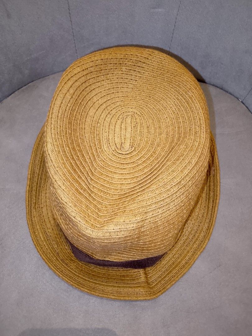 Geoffrey Beene Straw Fedora Hat - Size XL (Category: Hats & Beanies) located in Binangonan. Submitted by yuristalin888 (Listing ID 1447898427, Image 2). Description: - Brand: Geoffrey Beene - Style: Straw Fedora Hat - Size: XL - Color: Tan straw with dark brown ribbon band - Features: Great for sunny days, comfortable fit.