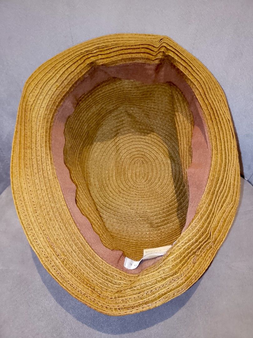 Geoffrey Beene Straw Fedora Hat - Size XL (Category: Hats & Beanies) located in Binangonan. Submitted by yuristalin888 (Listing ID 1447898427, Image 3). Description: - Brand: Geoffrey Beene - Style: Straw Fedora Hat - Size: XL - Color: Tan straw with dark brown ribbon band - Features: Great for sunny days, comfortable fit.