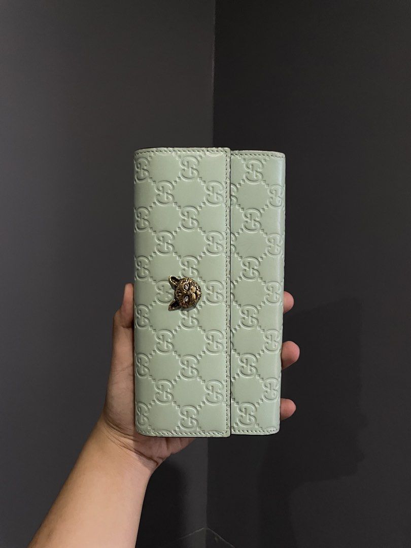 Gucci GG Monogram Wallet Tiger Head Clasp Mint (Category: Luxury Bags & Wallets) located in Cavite. Submitted by smoocollextion (Listing ID 1447951113, Image 1). Description: FOR SALE: Gucci Mint Animalier GG Signature Long Wallet ₱10,000 ✔️ Guaranteed Authentic ✔️ Money-back guarantee if proven fake ✔️ With minimal signs of use ✔️ Well-maintained and in excellent condition 📍Location: Bacoor, Cavite 🚚 Shipping via Lalamove/LBC (shipping fee to 