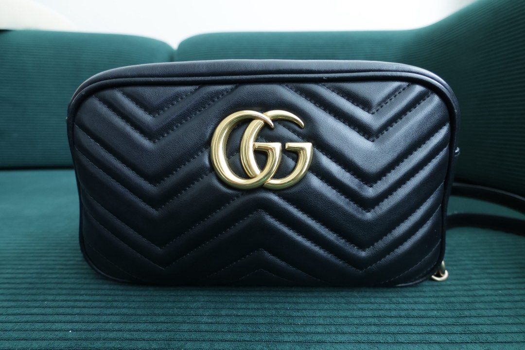 Gucci Marmont Small Camera Bag Black (Category: Luxury Bags & Wallets) located in Quezon City. Submitted by cammi_ (Listing ID 1447960190, Image 2). Description: - Authentic Gucci Marmont small bag - Color: Black - Material: Matelasse leather - Hardware: Gold GG logo - Closure: Zip closure - Perfect for: Everyday use or nights out - Capacity: Fits essentials - Condition: Excellent Condition - Purchased from Canon E-bags Consignment.
