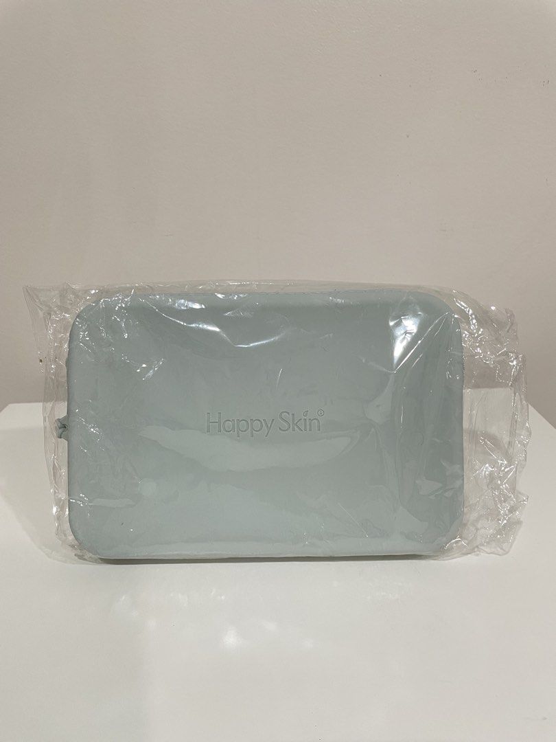 Happy Skin Cosmetic Bag (Category: Purses & Pouches) located in Makati City. Submitted by rarity_28 (Listing ID 1447985371, Image 1). Description: HAPPY SKIN - Silicone Pouch in Light Blue - Brand New - ₱350.