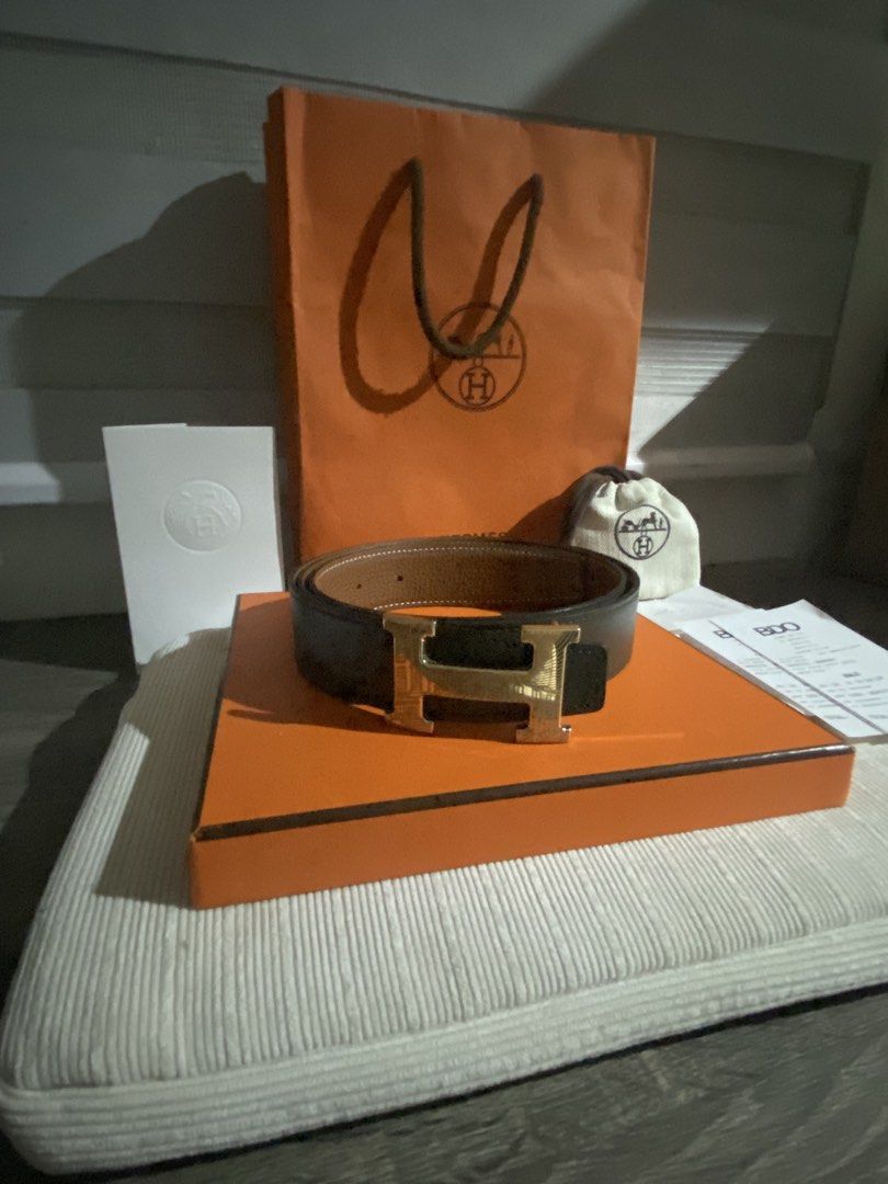 Hermes Belt with Gold H Buckle (Category: Luxury Accessories) located in Manila. Submitted by safecloud_c3f1ed (Listing ID 1447890203, Image 3). Description: - Authentic Hermes Belt - Iconic Gold H Buckle - Reversible: Black on one side, Brown on the other - Includes Original Box, Dust Bag, Shopping Bag, and Receipt - Classic and versatile accessory to elevate any outfit Negotiable .