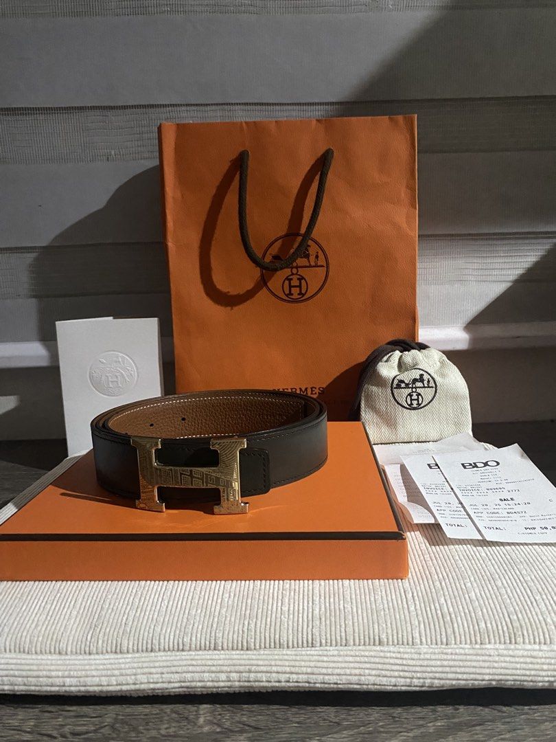 Hermes Belt with Gold H Buckle (Category: Luxury Accessories) located in Manila. Submitted by safecloud_c3f1ed (Listing ID 1447890203, Image 2). Description: - Authentic Hermes Belt - Iconic Gold H Buckle - Reversible: Black on one side, Brown on the other - Includes Original Box, Dust Bag, Shopping Bag, and Receipt - Classic and versatile accessory to elevate any outfit Negotiable .